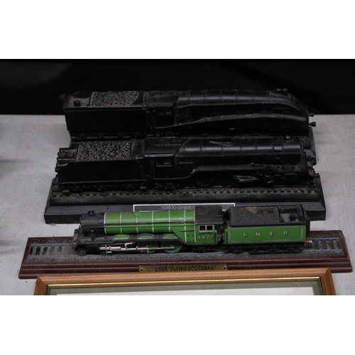 879 - A QUANTITY OF RAILWAY RELATED ITEMS TO INCLUDE THREE MODELS OF TRAINS, TEA CARDS, A PORE-DECIMAL COI... 