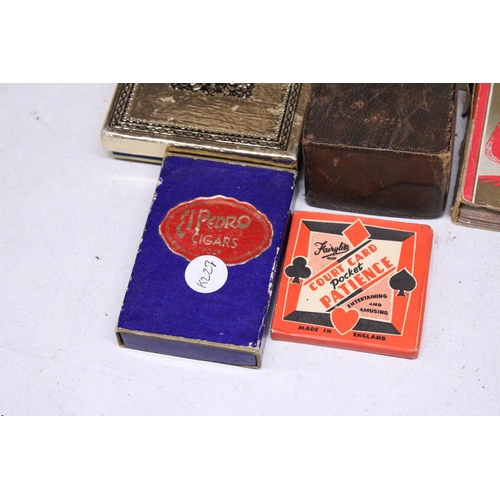 885 - A COLLECTION OF VINTAGE PLAYING CARDS