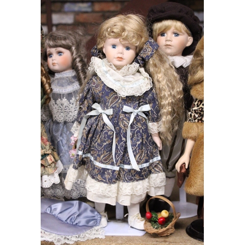 892 - SIX COLLECTABLE DOLLS