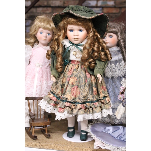 892 - SIX COLLECTABLE DOLLS