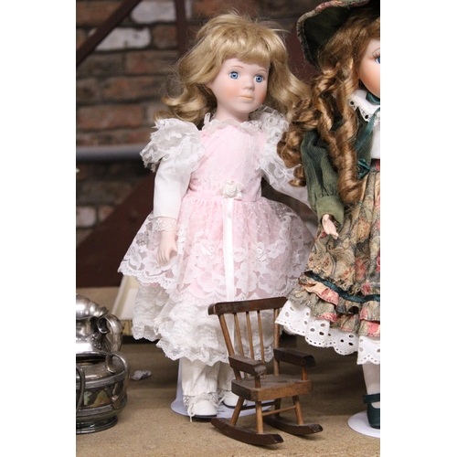 892 - SIX COLLECTABLE DOLLS