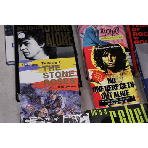 911 - A COLLECTION OF MUSIC BOOKS TO INCLUDE THE STONE ROSES, PHIL SPECTOR, ETC