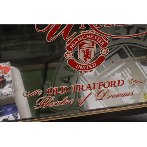 912 - A MANCHESTER UNITED THEMED WALL MIRROR