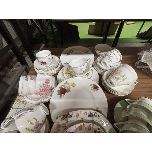 1010 - A LARGE QUANTITY OF TEACUPS, SAUCERS, SIDE PLATES, CAKE PLATES TO INCLUDE ROYAL ASCOT, ROYAL GRAFTON... 