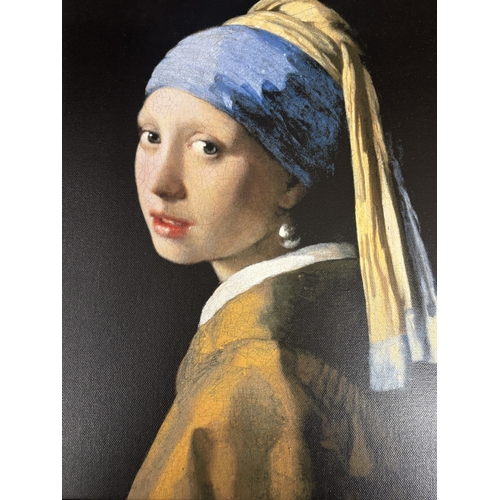 1043 - A FRAMED OIL ON CANVAS OF A GIRL WITH A PEARL EARRING AFTER JOHANNES VERMEER