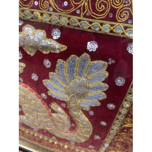 370 - A VINTAGE FRAMED AND GLAZED BEADED SEQUINED CHINESE DRAGON EMBROIDERY TAPESTRY ART - 64 X 49 CM