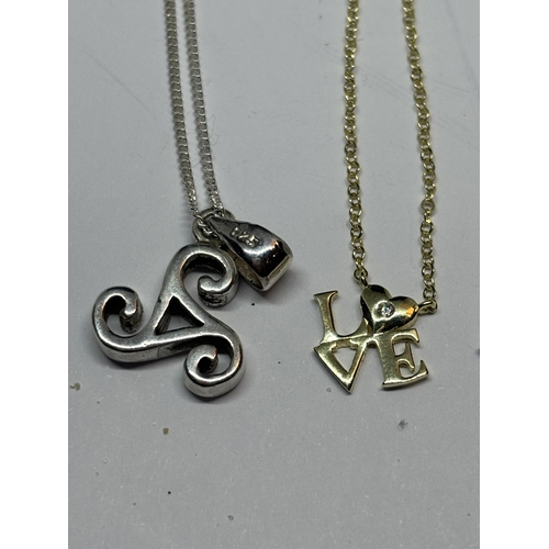 580 - FOUR MARKED SILVER NECKLACES WITH PENDANTS TO INCLUDE A YELLOW GOLD AND A ROSE GOLD PLATED