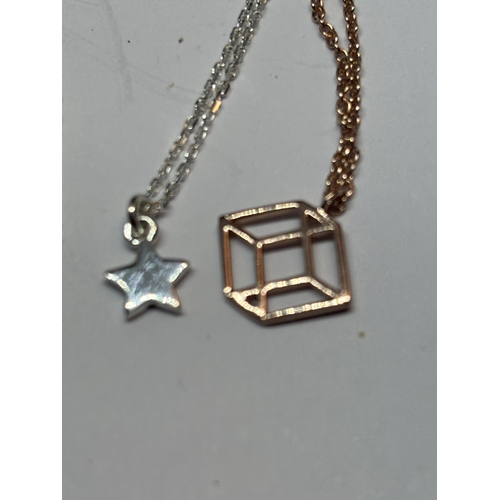 580 - FOUR MARKED SILVER NECKLACES WITH PENDANTS TO INCLUDE A YELLOW GOLD AND A ROSE GOLD PLATED