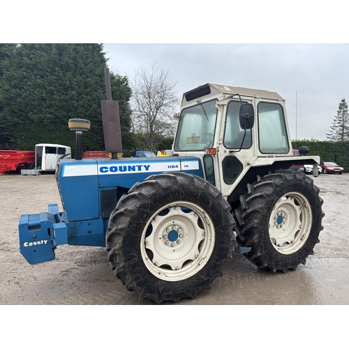 A 1981 COUNTY TW1184 TRACTOR, REGISTRATION NDV 411W, COMPLETE WITH A SET OF 10 COUNTY FRONT WEIGHTS, NEW BATTERY, REGISTRATION NDV 411W, CURRENT OWNER SINCE 2011, THE TRACTOR IS REGISTERED ON A V5C BUT THE VENDOR HAS LOST THE DOCUMENT - SEE THE VIDEO AT https://youtu.be/ybT0BWxHcto?si=KtL6Wc_Wb5ZPZhsK . FROM A FARM DISPERSAL FROM LANCASHIRE- NO VAT-LOT NUMBERS 201 TO 205 AND 251 TO 258 HAVE COME FROM A FARM DISPERSAL FROM A RETIRED FARMER FROM LANCASHIRE. THEY ARE WELL MAINTAINED AND WERE A CHERISHED COLLECTION. THEY ARE BEING SOLD DUE TO ILL HEALTH