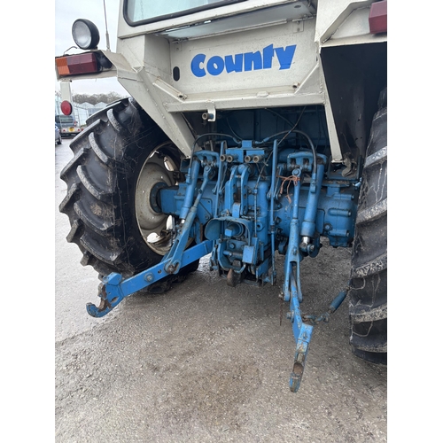 201 - A 1981 COUNTY TW1184 TRACTOR, REGISTRATION NDV 411W, COMPLETE WITH A SET OF 10 COUNTY FRONT WEIGHTS,... 