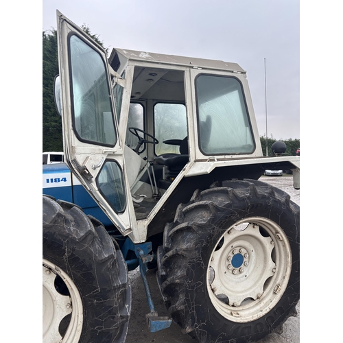 201 - A 1981 COUNTY TW1184 TRACTOR, REGISTRATION NDV 411W, COMPLETE WITH A SET OF 10 COUNTY FRONT WEIGHTS,... 