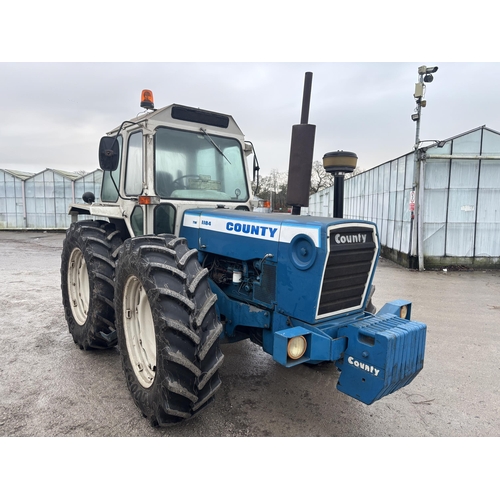 201 - A 1981 COUNTY TW1184 TRACTOR, REGISTRATION NDV 411W, COMPLETE WITH A SET OF 10 COUNTY FRONT WEIGHTS,... 