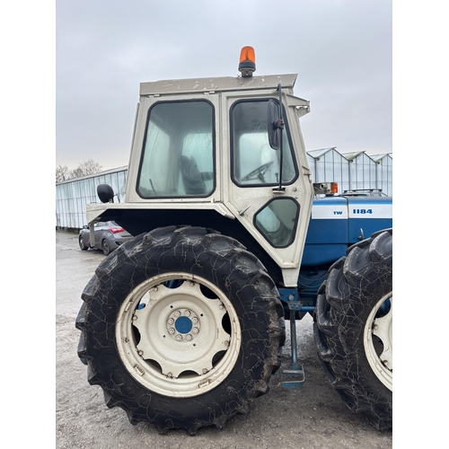 201 - A 1981 COUNTY TW1184 TRACTOR, REGISTRATION NDV 411W, COMPLETE WITH A SET OF 10 COUNTY FRONT WEIGHTS,... 