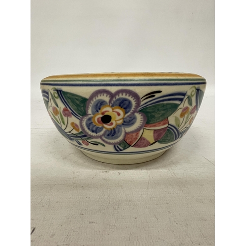 39 - A VINTAGE POOLE POTTERY BOWL WITH FLORAL PATTERN AND IMPRESSED POOLE MARK TO THE BASE, DIAMETER 20CM