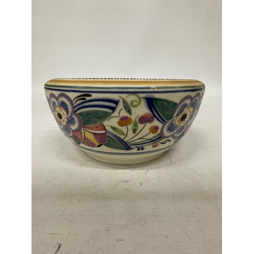 39 - A VINTAGE POOLE POTTERY BOWL WITH FLORAL PATTERN AND IMPRESSED POOLE MARK TO THE BASE, DIAMETER 20CM