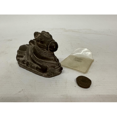 123 - A BLACK STONE NANDI FIGURE TOGETHER WITH A POSSIBLE INDIA GUJARAT FALUS COIN