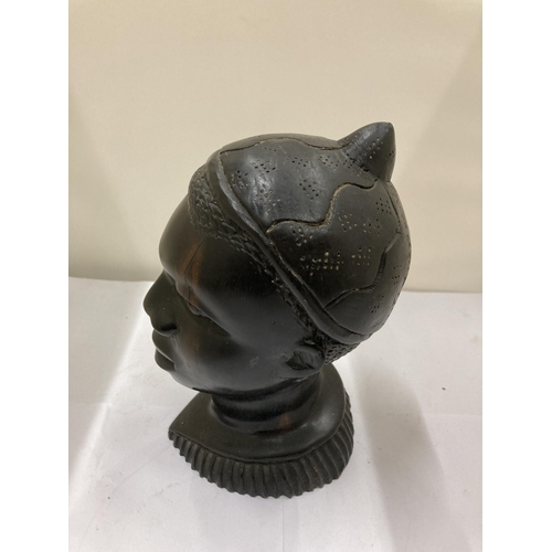 261 - AN AFRICAN THEMED HARDWOOD BUST, HEIGHT 17CM