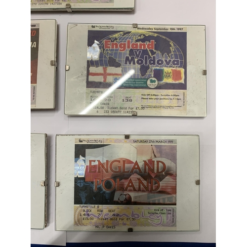 296 - FIVE FRAMED AND GLAZED VINTAGE ENGLAND WEMBLEY FOOTBALL TICKETS