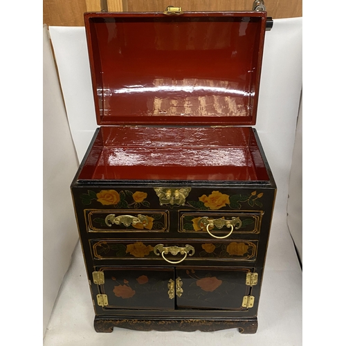 301 - A JAPANESE LACQUERED DOME TOP CASKET JEWELLERY CHEST WITH BRASS HANDLES/HINGES AND REFINED FLORAL DE... 