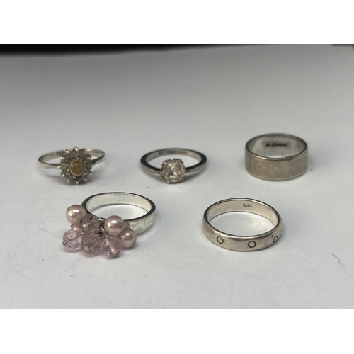 551 - FIVE VARIOUS MARKED SILVER RINGS