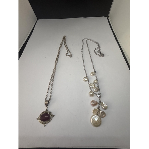 558 - TWO MARKED SILVER NECKLACES