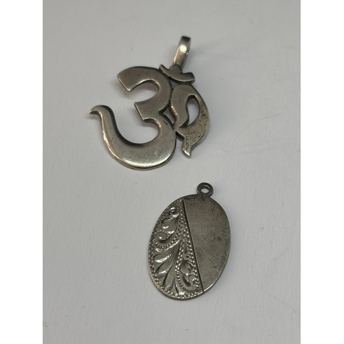 562 - SIX VARIOUS MARKED SILVER PENDANTS