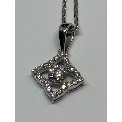 584 - AN 18 CARAT WHITE GOLD PENDANT WITH CHAIN, STUDDED WITH 0.44 CARATS OF ROUND BRILLIANT CUT NATURAL D... 