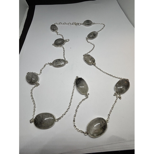 616 - A MARKED SILVER NECKLACE WITH GREY/BLACK STONES IN A PRESENTATION BOX