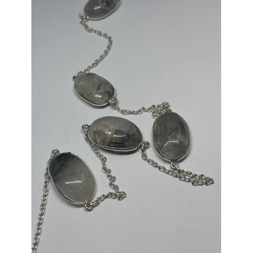 616 - A MARKED SILVER NECKLACE WITH GREY/BLACK STONES IN A PRESENTATION BOX