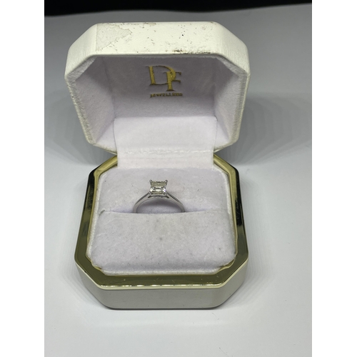 639 - A MARKED 9 CARAT WHITE GOLD RING WITH SQUARE STONE TESTING TO DIAMOND IN A PRESENTATION BOX