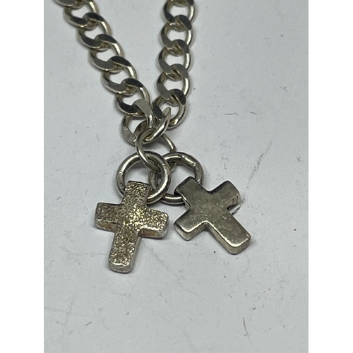 662 - A MARKED SILVER BRACELET WITH DOUBLE HEART, DOUBLE CROSS AND DOUBLE STAR CHARMS