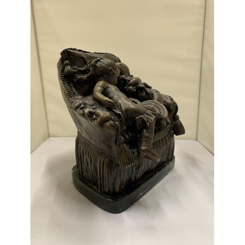 811 - A BRONZE STUDY OF A BOY AND GIRL SITTING ON A CHAIR, ON A MARBLE BASE, HEIGHT 21CM, WIDTH 18CM