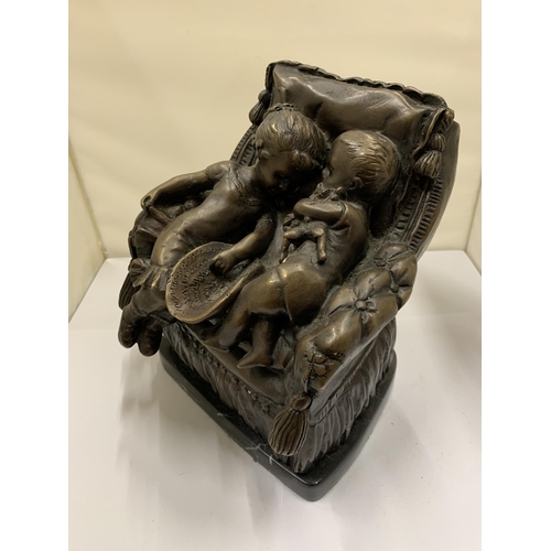 811 - A BRONZE STUDY OF A BOY AND GIRL SITTING ON A CHAIR, ON A MARBLE BASE, HEIGHT 21CM, WIDTH 18CM