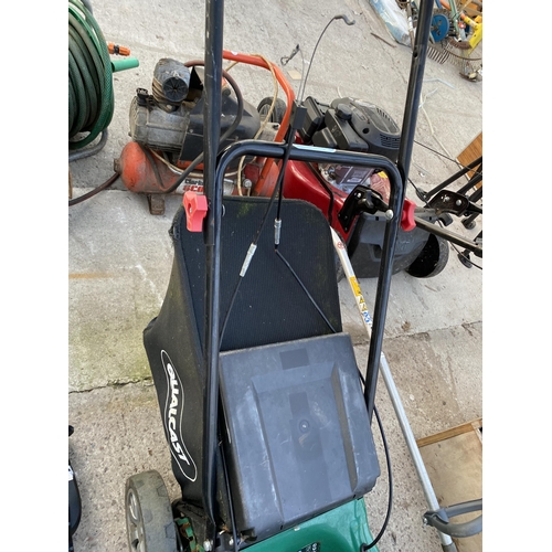 1728 - A QUALCAST PETROL LAWN MOWER WITH GRASS BOX AND BRIGGS AND STRATTON ENGINE