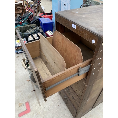 1792 - A VINTAGE WOODEN FOUR DRAWER FILING CABINET