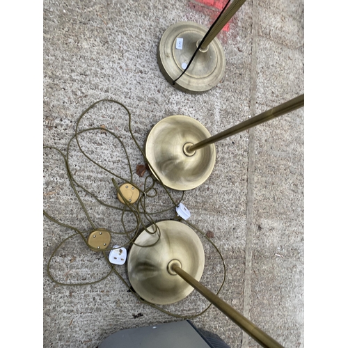 2410 - THREE BRASS EFFECT STANDARD LAMPS