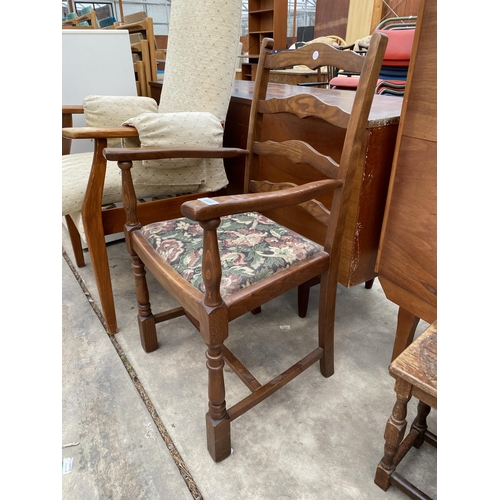 3030 - A TEAK ARMCHAIR AND AN OAK LADDERBACK CARVER DINING CHAIR