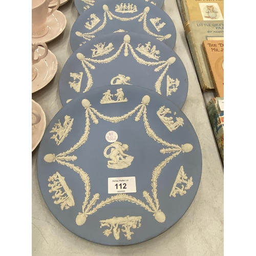 112 - A COLLECTION OF BLUE WEDGWOOD JASPERWARE TO INCLUDE A DRESSING TABLE TRAY, COLLECTOR'S PLATES AND VA... 