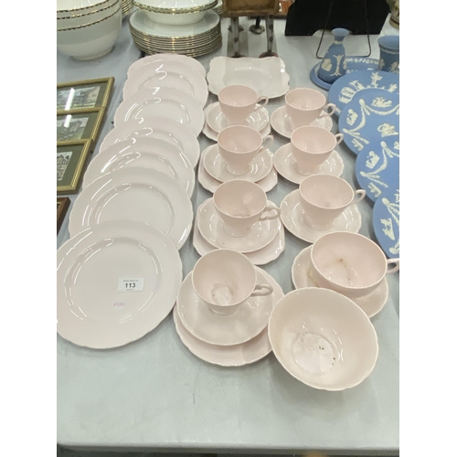 113 - A POWDER PINK TUSCAN PLANT TEASET TO INCLUDE PLATES, CUPS, SAUCERS, CAKE PLATE, ETC,.,