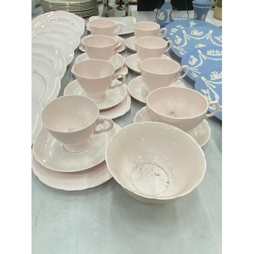 113 - A POWDER PINK TUSCAN PLANT TEASET TO INCLUDE PLATES, CUPS, SAUCERS, CAKE PLATE, ETC,.,