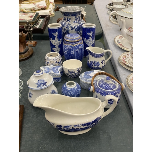 116 - A QUANTITY OF BLUE AND WHITE CERAMICS TO INCLUDE A RINGTONS TEA CADDY, A PAIR OF FLORAL PRUNUS VASES... 