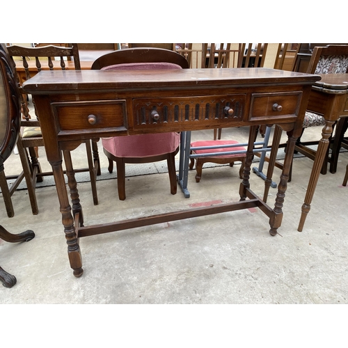 2549 - A OAK JACOBEAN STYLE THREE DRAWER SIDE TABLE 42