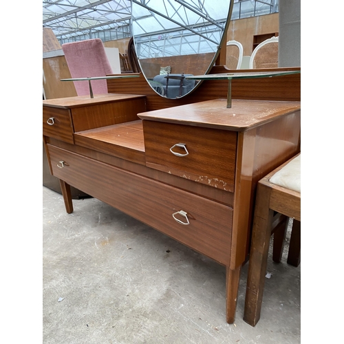 2711 - A RETRO LEBUS STEPPED DRESSING TABLE ENCLOSING THREE DRAWERS AND TWO GLASS SHELVES, 43