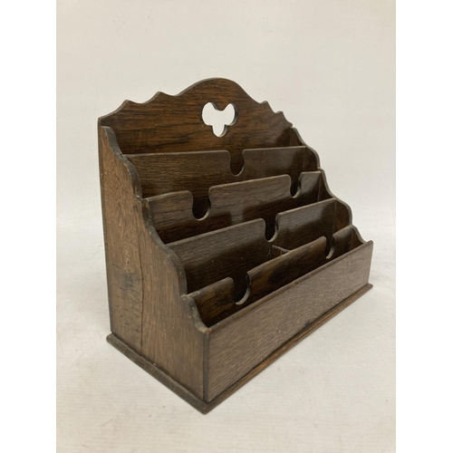 37 - A VINTAGE OAK STATIONERY LETTER RACK