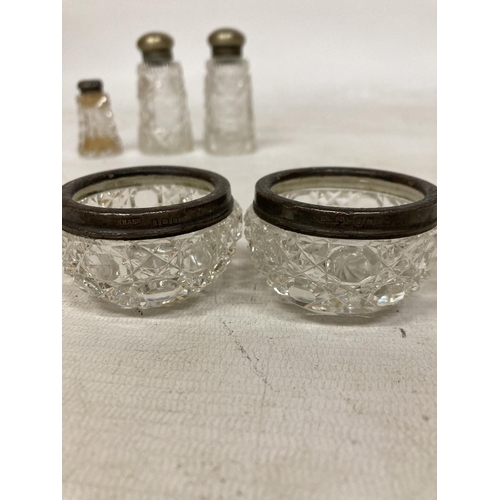 40 - SIX GLASS CONDIMENT ITEMS TO INCLUDE FOUR WITH HALLMARKED SILVER RIMS