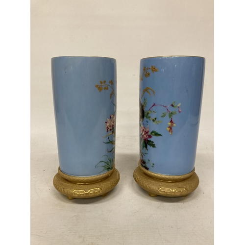 46 - TWO FRENCH CIRCA 1870 PORCELAIN VASES WITH HANDPAINTED BIRDS ON A GILT BASE, HEIGHT 25CM