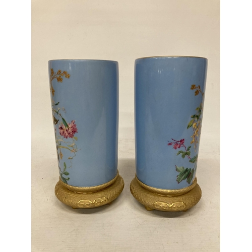 46 - TWO FRENCH CIRCA 1870 PORCELAIN VASES WITH HANDPAINTED BIRDS ON A GILT BASE, HEIGHT 25CM