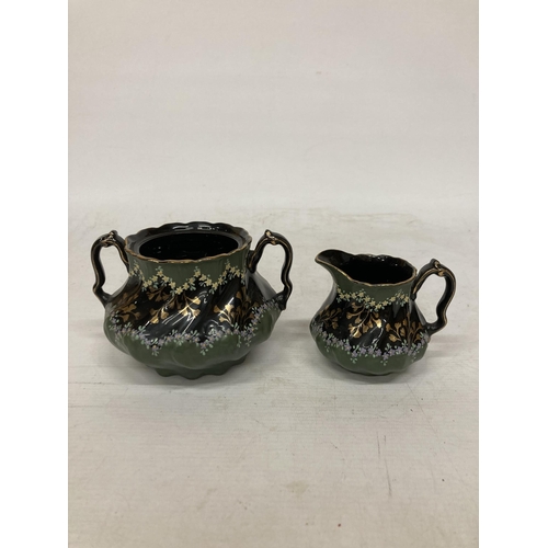 50 - FIVE PIECES OF 19TH CENTURY JACKFIELD POTTERY TO INCLUDE A SAMOVAR, TEAPOT AND STAND, SUGAR BOWL AND... 