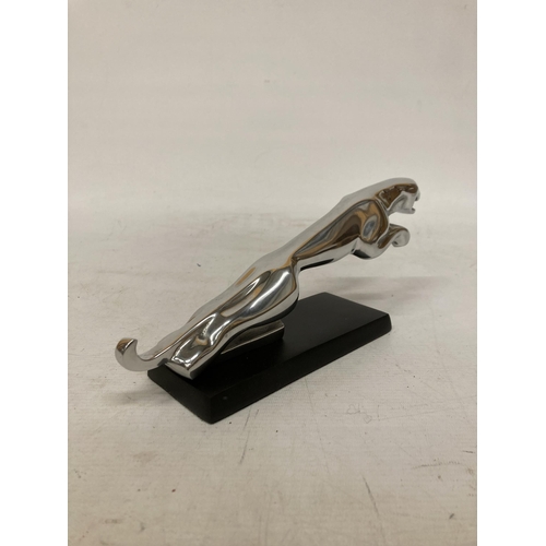 55 - A CHROME JAGUAR CAR MASCOT ON A BASE, HEIGHT 12CM, LENGTH 30CM