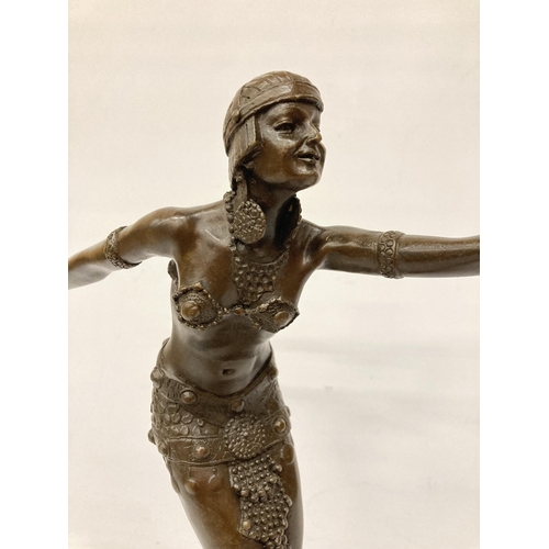 69 - A BRONZE ART DECO LADY DANCER ON A MARBLE BASE, HEIGHT 50CM